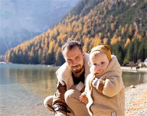 A father and a daughter in nature together