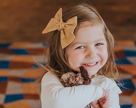 Child with Moose Toy