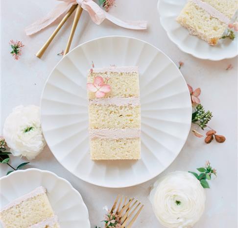 overhead photo of wedding cake on a plate