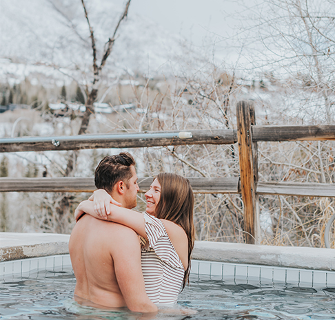 Couple in scenic hot tub