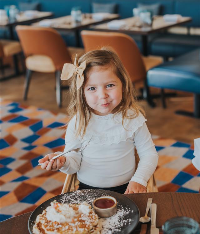 Little girls eating breakfast at West End Social
