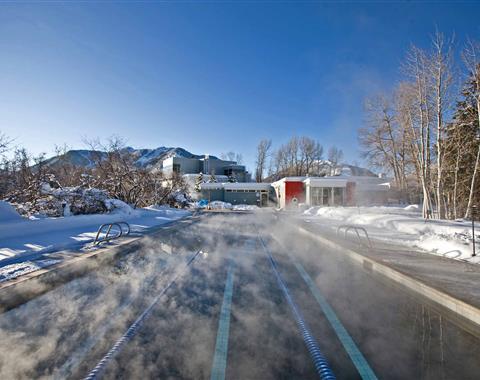 outdoor laptop with steam and snow in winter season